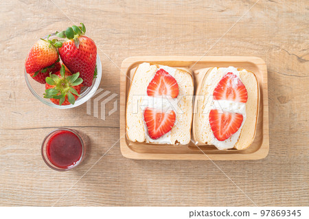 pancake sandwich strawberry fresh cream 97869345