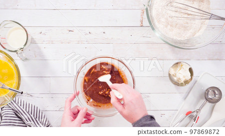 Flat lay. Mixing ingredients to bake chocolate raspberry cupcakes. Flat lay. Mixing ingredients to bake chocolate raspberry cupcakes. 97869872
