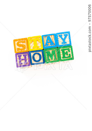 STAY HOME sign out of kids' alphabet blocks on a white background. STAY HOME sign out of kids' alphabet blocks on a white background. 97870006