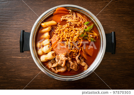 Budae Jjigae or Budaejjigae (Army stew or Army base stew). It is loaded with Kimchi, spam, sausages, ramen noodles and much more 97870303