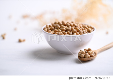 Soybean seeds in bowl with spoon, food ingredients high protein good for vegetarian and vegan 97870942