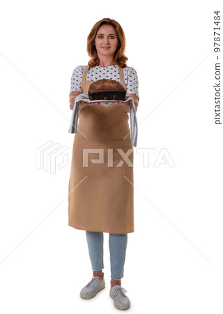 Full length of woman in apron holding a spelt sourdough homemade bread, isolated on white background Full length of woman in apron holding a spelt sourdough homemade bread, isolated on white background 97871484
