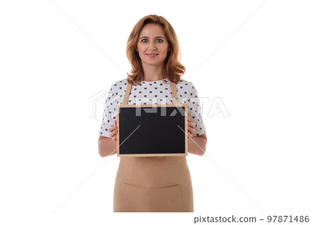 Coffee waitress holding a chalk board. Beautiful woman in barista apron holding empty blackboard on white background isolated Coffee waitress holding a chalk board. Beautiful woman in barista apron holding empty blackboard on white background isolated 97871486