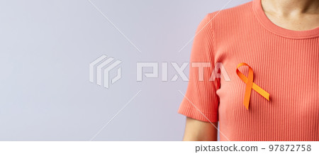 Orange Ribbon for Leukemia, Kidney cancer day, world Multiple Sclerosis, CRPS, Self Injury Awareness month. Healthcare and word cancer day concept 97872758