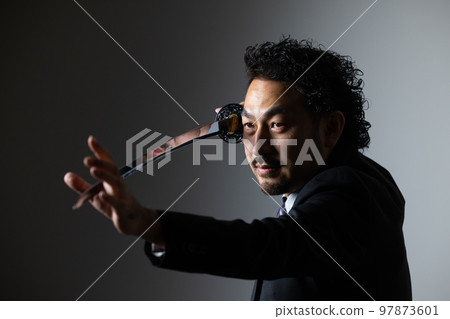 A bearded man holding a Japanese sword (suit version) A bearded man holding a Japanese sword (suit version) 97873601