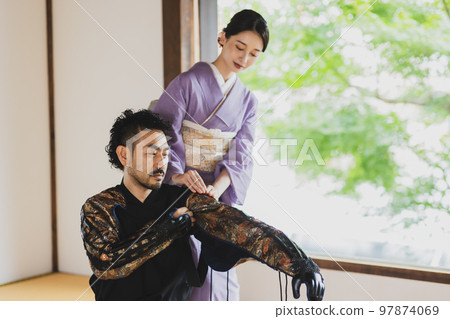 Bearded samurai dressing 97874069