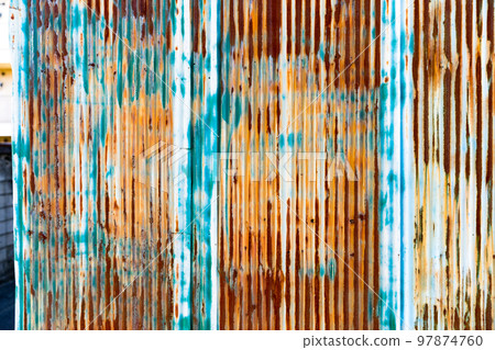 The outer wall of the rusted tin plate 97874760