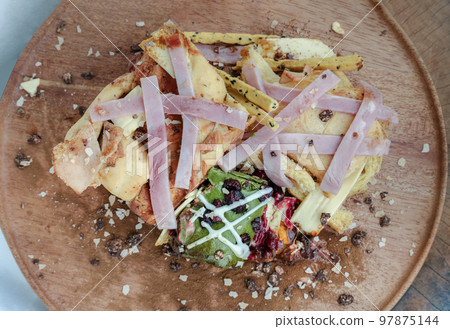 Brioche Truffle Ham Cheese Pumpkin Bread, mixed with Cheese Cake Christmas Protein Bar and mixed nuts sprinkle on the wooden tray. Brioche Truffle Ham Cheese Pumpkin Bread, mixed with Cheese Cake Christmas Protein Bar and mixed nuts sprinkle on the wooden tray. 97875144