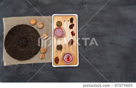 Chinese tea ceremony pu-erh tea black background, top view, copy space 97875605