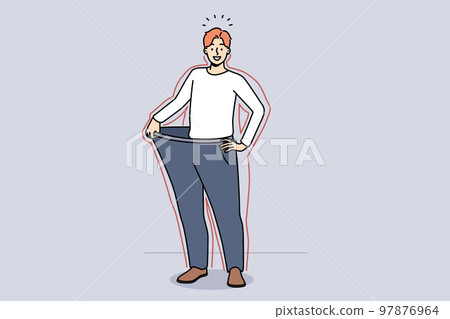Smiling man in loose pants show weight loss Smiling man in loose pants show weight loss 97876964