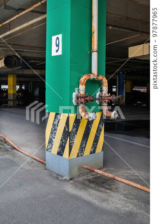 Concrete column with metal pipe. 97877965