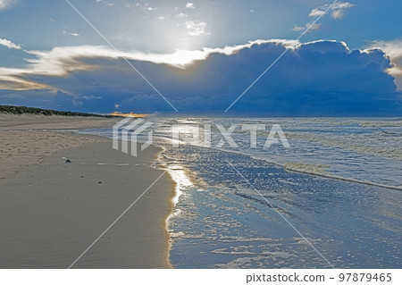 Winter image of a North Sea beach near Vejers at sunset Winter image of a North Sea beach near Vejers at sunset 97879465