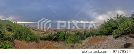 Panorama over the beach in Stillingen bay in Denmark during the day 97879534