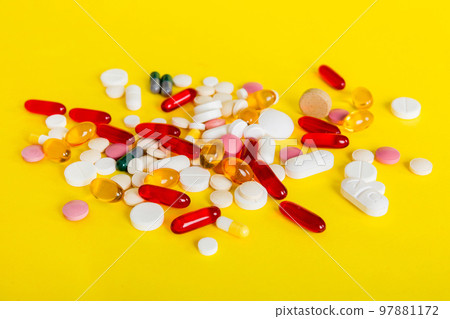 Many different colorful medication and pills perspective view. Set of many pills on colored background 97881172