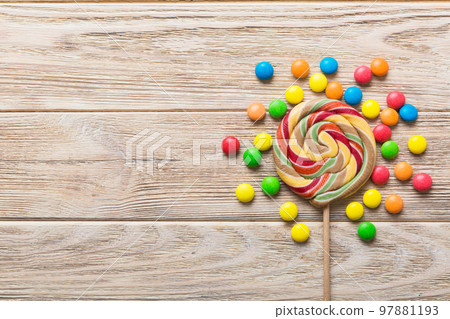 Tasty appetizing Party Accessories Happy Birthday Sweet. Different types of candies on colored background, copy space. Colorful birthday party background Tasty appetizing Party Accessories Happy Birthday Sweet. Different types of candies on colored background, copy space. Colorful birthday party background 97881193