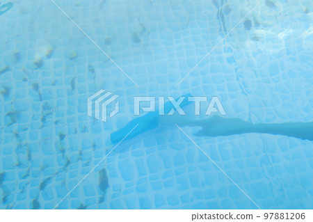 framed pool brushing on sunny. Contaminated pool cleaning concept framed pool brushing on sunny. Contaminated pool cleaning concept 97881206