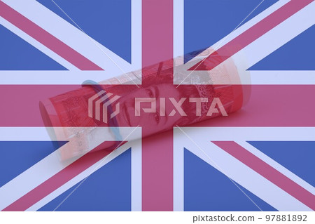 Double exposure of British Flag and Pound sterling banknote. 97881892