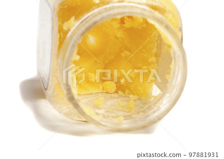 Ghee in jar isolated on white background. 97881931