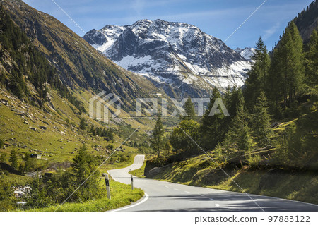 Grimsel and Furka mountain pass, dramatic road with swiss alps, Switzerland 97883122