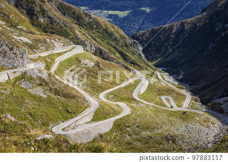 St. Gotthard mountain pass, dramatic road with swiss alps, Switzerland St. Gotthard mountain pass, dramatic road with swiss alps, Switzerland 97883157