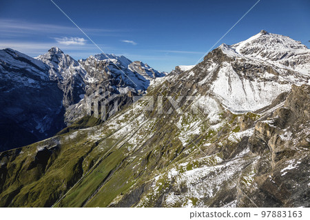 Top of the Schilthorn and view of Bernese Swiss alps, Switzerland Top of the Schilthorn and view of Bernese Swiss alps, Switzerland 97883163