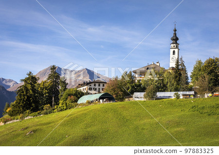 Idyllic landscape of Ftan village, Engadine, Swiss Alps, Switzerland Idyllic landscape of Ftan village, Engadine, Swiss Alps, Switzerland 97883325