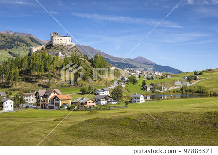 Idyllic landscape of Scuol Tarasp village, Engadine, Swiss Alps, Switzerland 97883371