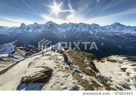 Top of the Schilthorn and view of Bernese Swiss alps, Switzerland Top of the Schilthorn and view of Bernese Swiss alps, Switzerland 97883443