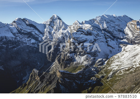 Top of the Schilthorn and view of Breithorn and Bernese Swiss alps, Switzerland Top of the Schilthorn and view of Breithorn and Bernese Swiss alps, Switzerland 97883510
