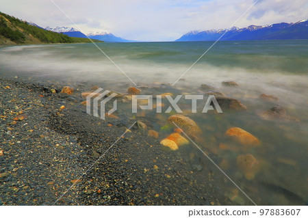 Melting frozen lake, Andes landscape in Tierra Del fuego, Ushuaia, Argentina 97883607