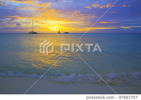 Secluded turquoise beach in Aruba, Caribbean Blue sea, Duth Antilles Secluded turquoise beach in Aruba, Caribbean Blue sea, Duth Antilles 97883707