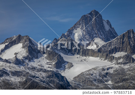 Dramatic Bernese swiss alps as seen from Nufenen Pass, Switzerland 97883718