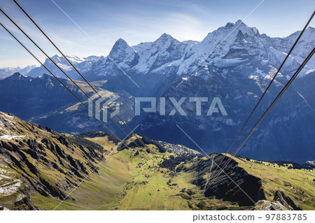 Top of the Schilthorn and view of Bernese Swiss alps, Switzerland Top of the Schilthorn and view of Bernese Swiss alps, Switzerland 97883785