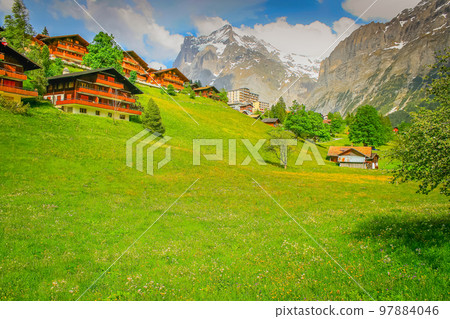 Grindelwald alpine village near Interlaken in the canton of Bern, Swiss alps 97884046