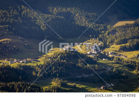 Above idyllic Scuol Tarasp village, Engadine, Swiss Alps, Switzerland 97884098