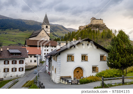 Idyllic landscape of Scuol Tarasp village, Engadine, Swiss Alps, Switzerland 97884135