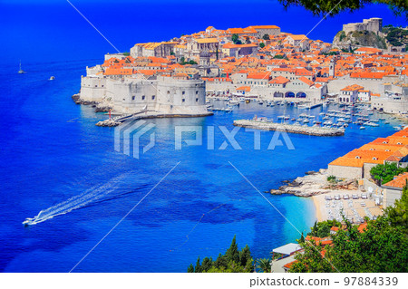 Dubrobvik old town, turquoise adriatic beach in Dalmatia, Croatia Dubrobvik old town, turquoise adriatic beach in Dalmatia, Croatia 97884339