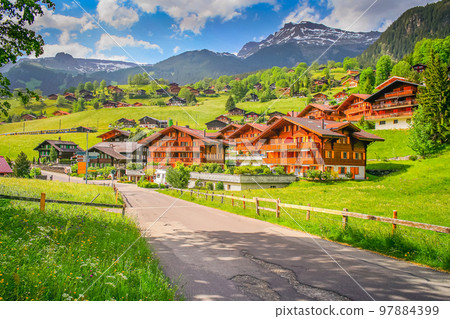 Grindelwald alpine village near Interlaken in the canton of Bern, Swiss alps Grindelwald alpine village near Interlaken in the canton of Bern, Swiss alps 97884399