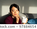 A woman thinking 97884654