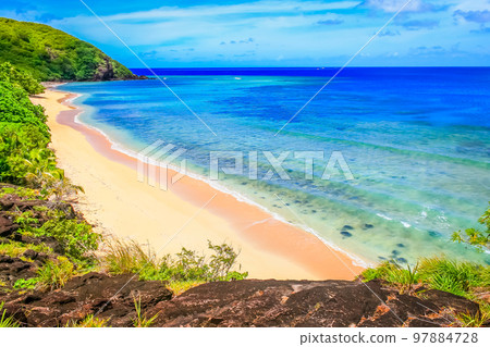 Tropical sandy beach at summer day in Fiji Islands, Pacific ocean Tropical sandy beach at summer day in Fiji Islands, Pacific ocean 97884728