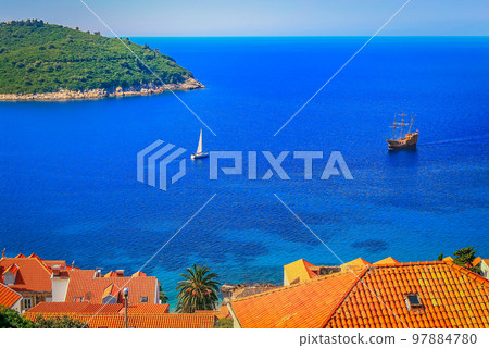 Dubrobvik old town, turquoise adriatic beach in Dalmatia, Croatia Dubrobvik old town, turquoise adriatic beach in Dalmatia, Croatia 97884780