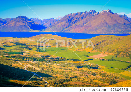 Above Queenstown and Lake Wakatipu in south Island, New Zealand at sunset 97884786