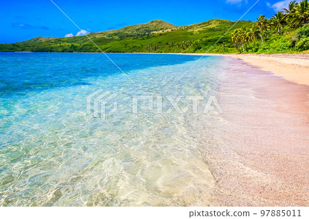 Tropical sandy beach at summer day in Fiji Islands, Pacific ocean 97885011