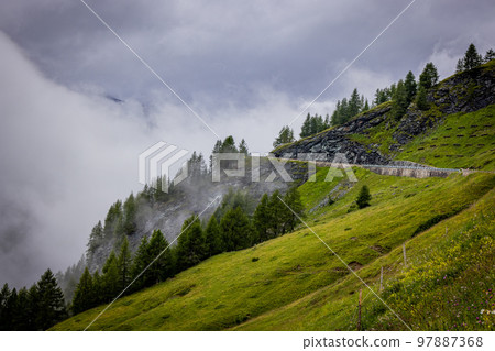 Grossglockner High Alpine Road in Austria in the mist 97887368