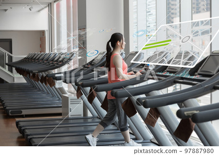 Fitness gym gym gym running machine woman 97887980