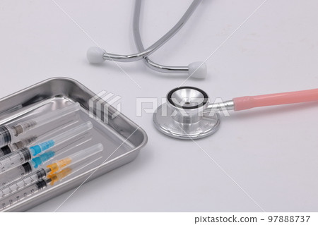 Image of vaccination (syringe, stethoscope) 97888737