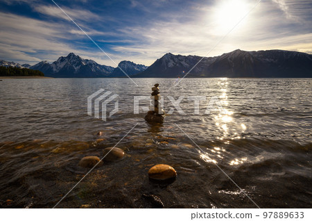 Balanced rock pyramid at the Jackson Lake at sunset, Wyoming, USA Balanced rock pyramid at the Jackson Lake at sunset, Wyoming, USA 97889633
