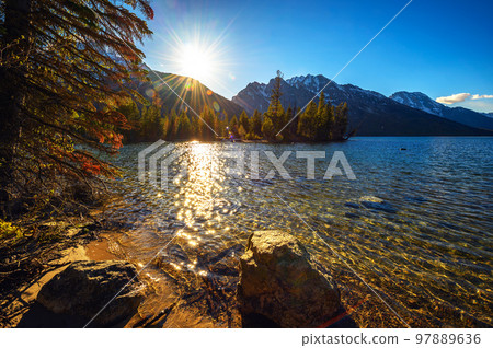 Sunset over Jenny Lake and Grand Teton Mountains in Wyoming, USA Sunset over Jenny Lake and Grand Teton Mountains in Wyoming, USA 97889636