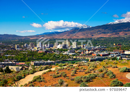 Downtown Reno skyline, Nevada, with hotels, casinos and surrounding mountains Downtown Reno skyline, Nevada, with hotels, casinos and surrounding mountains 97889647