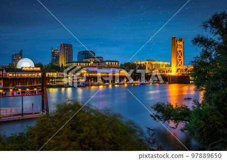 Tower Bridge and Sacramento River in Sacramento, California, captured at night Tower Bridge and Sacramento River in Sacramento, California, captured at night 97889650